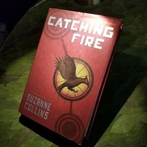 ❤️ Catching Fire Suzanne Collins